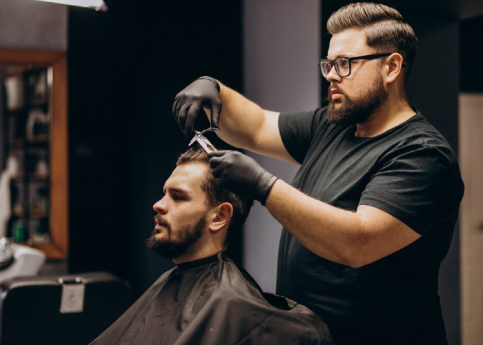 client-doing-hair-cut-barber-shop-salon