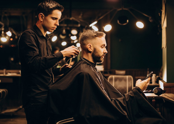 young-man-barbershop-trimming-hair